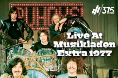 Live At Musikladen Extra 1977. Eine Bandgruppe steht um ein Schlagzeug, Logo von "375 media" oben rechts.