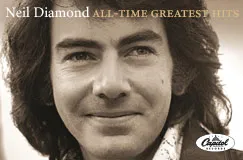 Text: „Neil Diamond ALL-TIME GREATEST HITS“. Ein lächelnder Mann mit langen Haaren in einem Porträt. Capitol Records Logo.