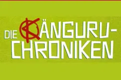 Text: "DIE KÄNGURU-CHRONIKEN". Grüner Hintergrund, der Buchstabe "Ä" hat ein rotes Anarchosymbol.