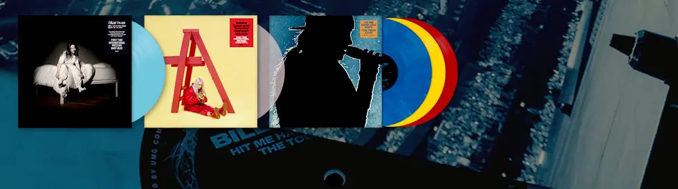 Verschiedene Albumcover mit bunten Schallplatten, darunter hellblau, rosa und rot-gelb-blau.