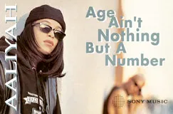 Text: "Aaliyah", "Age Ain't Nothing But A Number". Frau mit Sonnenbrille lehnt an einer Wand, Mann im Hintergrund.