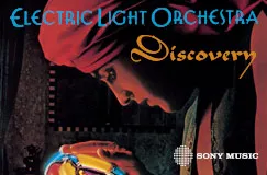 Text: "Electric Light Orchestra Discovery". Ein Mann betrachtet staunend ein leuchtendes Objekt.