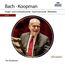 "Bach · Koopman. Orgel- und Cembalowerke · Kammermusik · Motetten. 9 CD. Ton Koopman. Ein Mann im Anzug lacht."