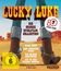 "Lucky Luke: Die große Spielfilm-Collection. Daisy Town, Sein größter Trick, Das große Abenteuer, Auf in den Wilden Westen." Cowboy-Stiefel und Wüstenlandschaft.