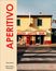 „APERITIVO“ in großer roter Schrift auf beigem Buch. Gebäude zeigt „RACCHI LOTTO BAR“, darunter Zebrastreifen.