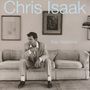 "Chris Isaak" und "Baja Sessions" in hellblauer Schrift. Schwarz-weißes Foto: Mann in Anzug auf einem Sofa., LP