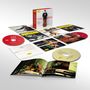 Box-Set "Jian Wang". Mehrere CDs und ein Booklet liegen auf einer Oberfläche. Musiker mit Cello abgebildet.
