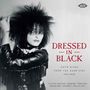 Text: "Dressed in Black - Goth Divas from the Dark Side, 1941-2025". Schwarz-weiß Porträt einer Frau mit vollem Haar.