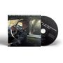 "Neil Young & The CHROME HEARTS - SECOND SONG." Ein Mann sitzt am Steuer in einem Auto, daneben eine CD., CD