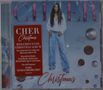 Rotes Textfeld: "CHER Christmas." Cher in weißem Hemd, blauen Jeans. Hintergrund: Kugeln und "Christmas" am Ende., CD