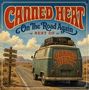 "CANNED HEAT On The Road Again BEST OF" in kräftigen Buchstaben über einem alten VW-Bus auf einer Landstraße. Retro-Stil.
