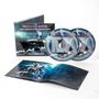 "TRANSATLANTIC The Absolute Universe" auf CD-Hüllen und einem geöffneten Booklet mit Weltraumthema.