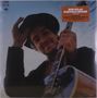 Text: "Bob Dylan Nashville Skyline". Eine Person lächelt, hält eine Gitarre und tippt an ihren Hut., LP