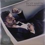 Text: "RICKY MARTIN, A QUIEN QUIERA ESCUCHAR, PRESSED ON COKE BOTTLE GREEN VINYL". Ein Mann im Anzug liegt entspannt., LP