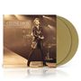"Céline Dion Live à Paris" steht oben. Ein Bild zeigt Céline Dion singend auf der Bühne, mit Mikrofon. Zwei goldene Vinyl-Schallplatten., LP
