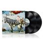 "The Flower Kings" steht in verschnörkelter Schrift. Ein Zebra mit Blumen und Schmetterlingen, davor zwei Schallplatten., 2 LPs