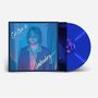 Texte: "Get Over it.", "Underdog", "AARON LEE TASJAN". Eine Schallplatte in Blau mit einem Mann in farbigem Licht., LP