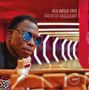 Text: "ALY KEÏTA TRIO BALAFON EVOLUTION." Ein Mann mit Sonnenbrille spielt ein Instrument in einem bunten Raum., CD