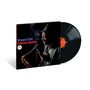 Cover mit Text "Wrapped Tight Coleman Hawkins". Ein Mann mit Anzug spielt Saxophon, daneben eine schwarze Schallplatte., LP