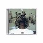 "Parental Advisory" Text unten. Ein Mensch mit dreadlock-ähnlichem Haar sitzt in einem medizinischen Raum., CD
