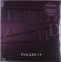 "GIRLS ALOUD" in großen Buchstaben, "TANGLED UP" darunter. Dunkler Hintergrund mit diagonalen Linien., LP