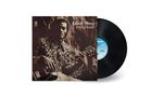 Text: "Chuck Berry Back Home". Mann mit Bluse hält eine Gitarre, Hintergrund im Sepia-Ton.