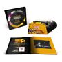 "Michael Garrick Voyages" Collection: Box, Schallplatten, Buch mit gelb-schwarzem Cover, Foto eines Pianisten., 4 LPs