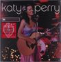 „katy perry“, „MTV UNPLUGGED“, „limited edition violet vinyl“. Eine lächelnde Frau mit Gitarre auf der Bühne., LP