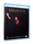 "Pavarotti: Live at Llangollen 1995." Ein lächelnder Mann winkt, gekleidet in Schwarz mit rotem Hemd, auf schwarzem Hintergrund.