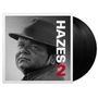 Text: "HAZES 2". Schwarz-weißes Porträt eines Mannes mit Hut, Vinylplatten im Hintergrund.