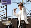 Text: "JOHNNY ARCHIVES LIVE", "FÊTE DE L'HUMA", "15 SEPTEMBRE 1985", "JOHNNY 85 HALLYDAY". Mann in weißer Jacke singt., 2 CDs