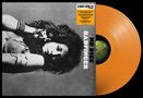 „No Dice, Badfinger“ steht vertikal. Eine Frau mit langen Haaren und Schmuck, daneben eine orangefarbene Vinyl-Schallplatte.