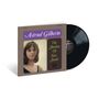 "Astrud Gilberto, The Shadow Of Your Smile." Cover zeigt eine Frau mit braunem Haar. Schallplatte daneben.