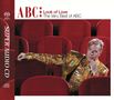 „ABC Look of Love The Very Best of ABC“, Super Audio CD. Ein Mann im goldenen Outfit sitzt auf roten Kinosesseln.