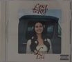 "Lana Del Rey", "Lust for Life". Frau mit Blumen im Haar lächelt vor einem Auto. , CD