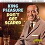 "King Pleasure - Don't Get Scared", ein Mann in Anzug lächelt, steht in einem stimmungsvollen, jazzigen Club., CD