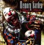 Texte: "Memory Garden", "Carnage Carnival". Ein gruseliger Clown mit roter Nase schaut aus einer Box und hält seinen Kopf., LP