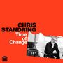 "CHRIS STANDRING Time of Change" steht auf einem roten Hintergrund. Rechts sitzt ein Mann gedankenverloren., LP