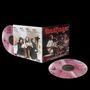 „Badfinger“ in roter Schrift, darunter: „Live at the Cambridge Performance Center“. Zwei bunte Schallplatten. Ein offenes Cover mit Bandfotos., 2 LPs
