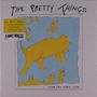 "The Pretty Things: from the other side." Ein gelbes Tier, umgeben von Händen, vor blauem Hintergrund., Single 10"