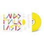 Buntes Buchstabendesign: "LAND TALK LASTS". Gelbe Vinylplatte sichtbar, handgeschriebene Notizen daneben., LP