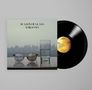 Der Text "SEA WATER GLASS THE RIPPLE" steht auf einem Plattencover. Daneben eine Schallplatte mit gelbem Label., LP