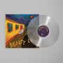 „BEAUTY LAND“ steht auf einem Albumcover und einer Schallplatte. Illustration: Gelbes Haus, Berge, roter Himmel., LP
