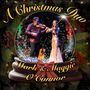Text: "A Christmas Duo, Mark & Maggie O'Connor". Eine Schneekugel mit einem Mann und einer Frau, die Geige spielen., CD