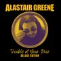ALASTAIR GREENE, Trouble at Your Door, DELUXE EDITION. Ein Mann mit Sonnenbrille in einem kreisförmigen Rahmen., CD
