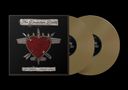 "The Dresden Dolls" und "Yes, Virginia... (Deluxe Version)" auf einem Cover mit einem roten Herz, umgeben von Stiften und Messern, daneben zwei goldene Schallplatten.