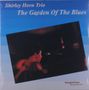 "Shirley Horn Trio: The Garden Of The Blues" steht auf blauem Hintergrund; Bild einer Frau am Mikro., LP