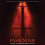 "Music from and inspired by the motion picture", "Passenger", "Music by Christopher Young".  
Kind in rotem Scheinwerferlicht auf Straße.