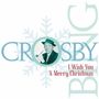 Text: "Crosby I Wish You A Merry Christmas." Ein Mann mit Hut und Pfeife vor einem Schneeflocken-Hintergrund.