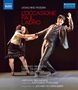Text: "Gioachino Rossini, L'occasione fa il ladro, Lorenzo Regazzo, Vera Talerko, Kenneth Tarver." Szene mit tanzenden Personen., Blu-ray Disc